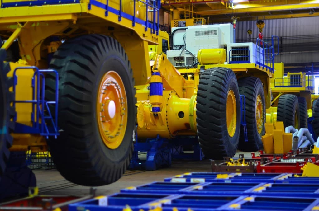 Heavy mining equipment in manufacturing facility