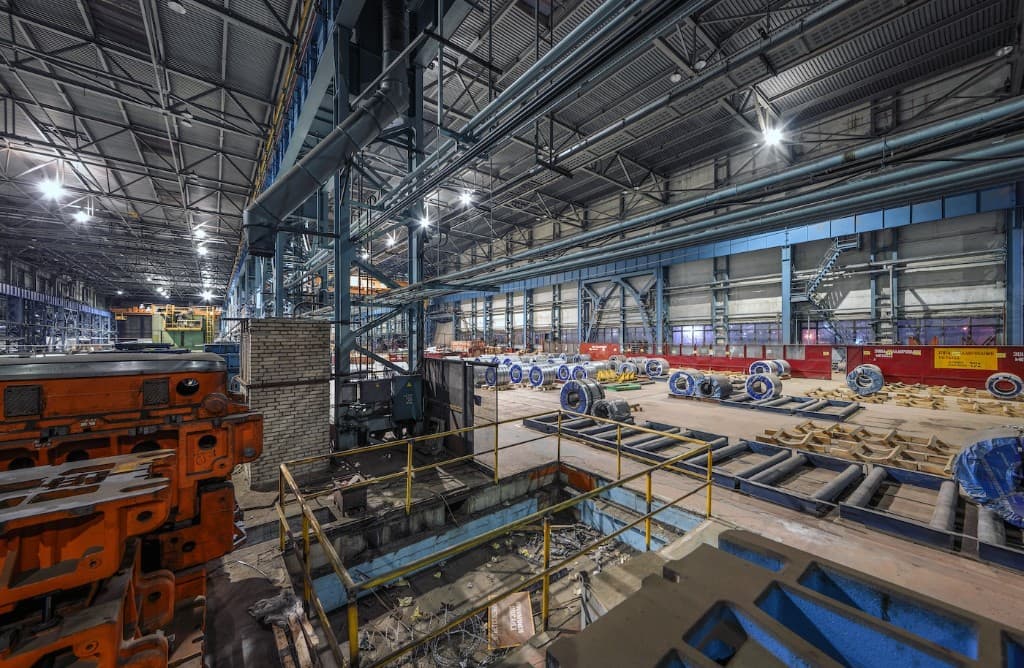 Manufacturing facility with steel coils and heavy machinery